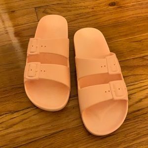 Never been worn Freedom Moses slides